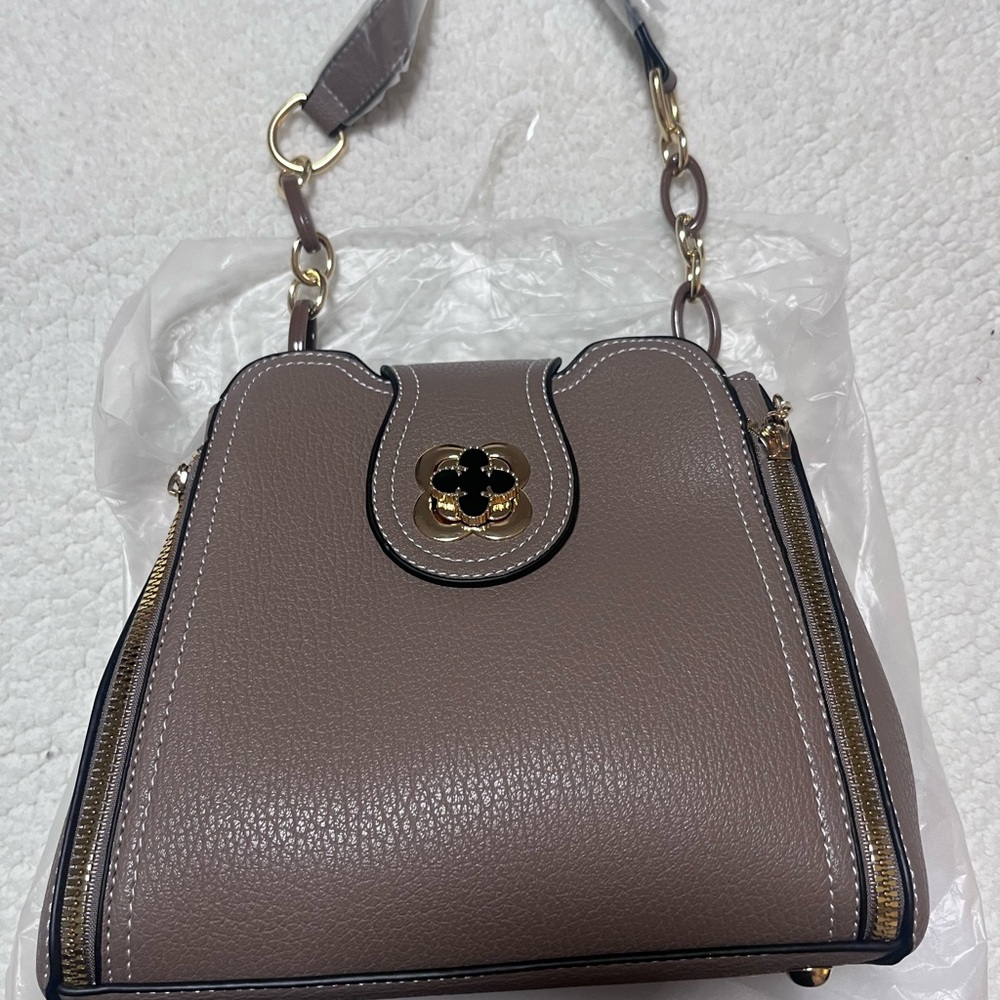 Elegant red Handbag/ crossbody chic extra straps. bag available in taupe color